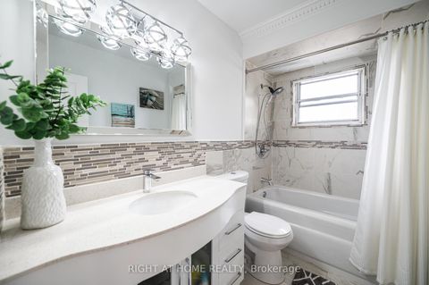 Photo 22 at 808 Sanok Drive, West Shore, Pickering