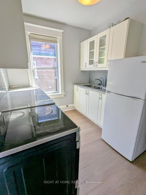 Photo 12 at 239 Woodbine Avenue, The Beaches, Toronto