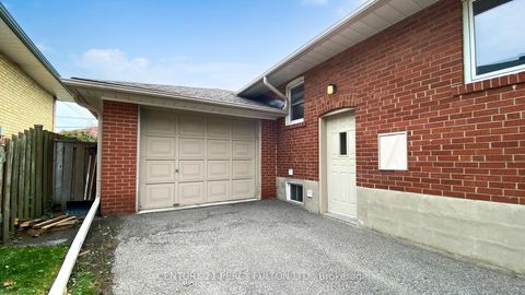 Photo 3 at 27 Grassington Crescent, Woburn, Toronto