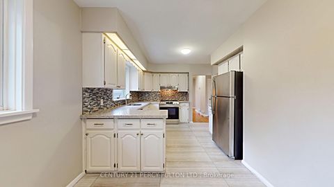 Photo 7 at 27 Grassington Crescent, Woburn, Toronto