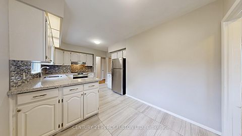 Photo 8 at 27 Grassington Crescent, Woburn, Toronto