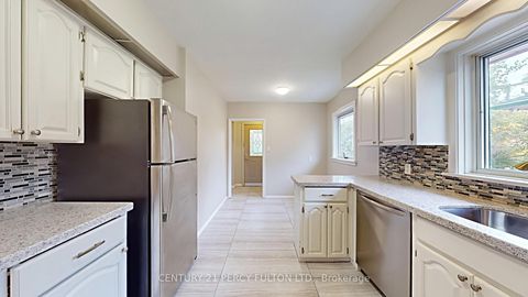 Photo 10 at 27 Grassington Crescent, Woburn, Toronto