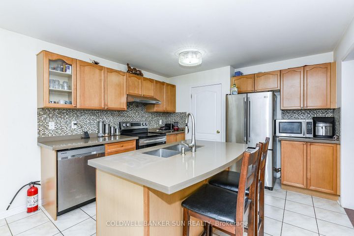Photo 12 at 34 Benmore Crescent, Vales of Castlemore, Brampton
