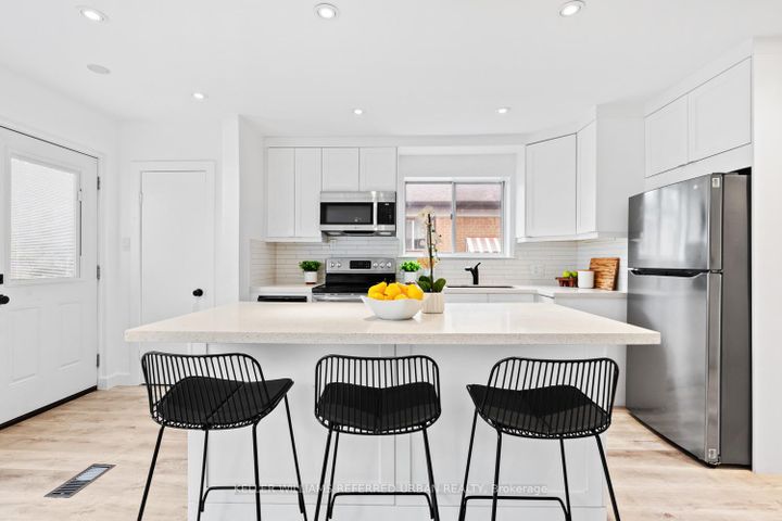 Photo 9 at 73 Trinnell Boulevard, Birchmount, Toronto