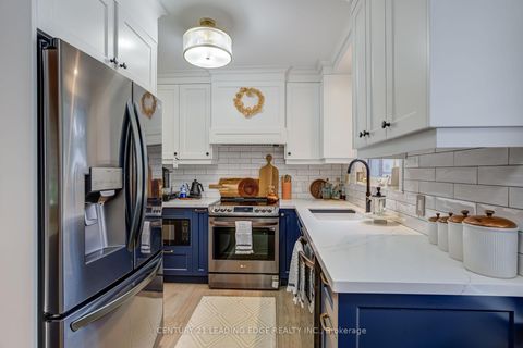 Photo 5 at 52 Green Lanes, City Centre West, Toronto
