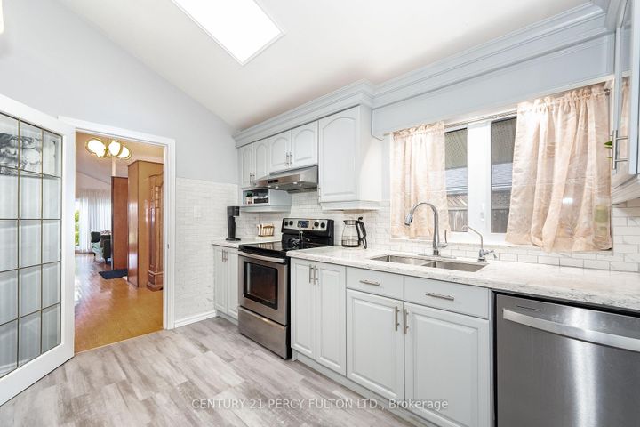 Photo 7 at 67 Orton Park Road, Morningside, Toronto