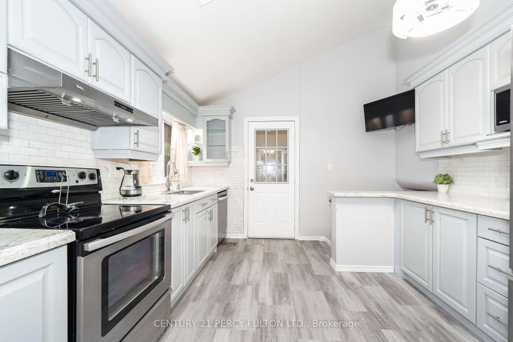 Photo 8 at 67 Orton Park Road, Morningside, Toronto