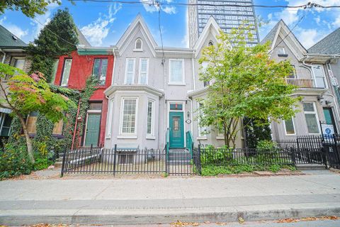 Photo 1 at 141 Gerrard Street E, Moss Park, Toronto