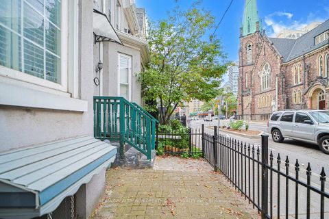 Photo 3 at 141 Gerrard Street E, Moss Park, Toronto