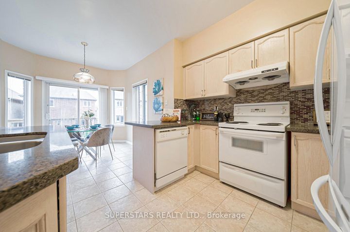 Photo 7 at 9 Weatherill Road, Berczy, Markham