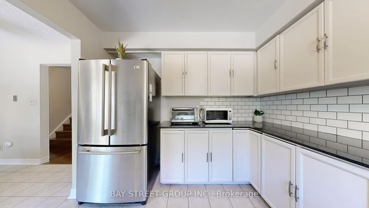 Photo 10 at 30 - 25 Cardwell Avenue, Malvern West, Toronto