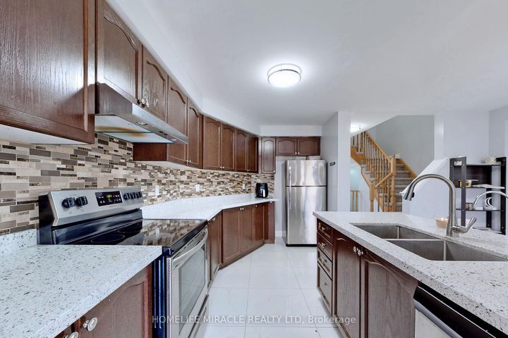 Photo 7 at 15 Masseyfield Street N, Bram East, Brampton