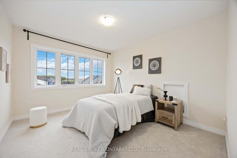 Photo 1 at 18 Lawrence Pilkington Avenue, Cornell, Markham