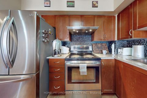 Photo 5 at 310 - 60 Joe Shuster Way, South Parkdale, Toronto