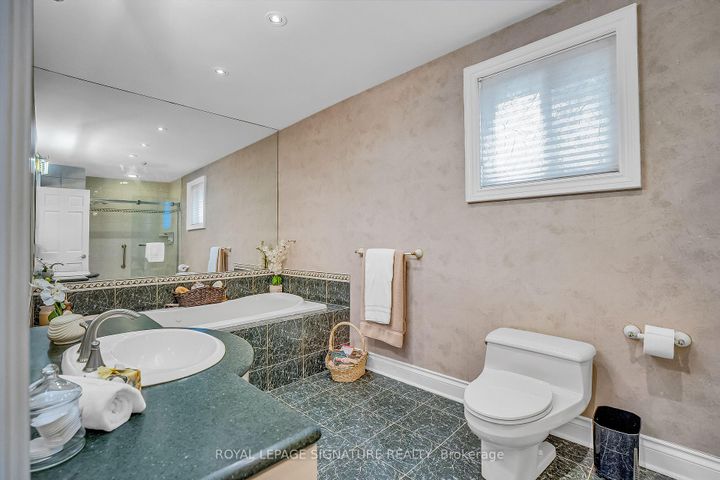 Photo 25 at 18 Mistflower Road, Hillcrest Village, Toronto