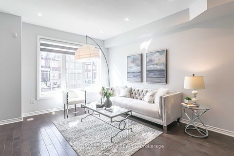 Photo 1 at 3 - 12 Eaton Park Lane, L'Amoreaux, Toronto