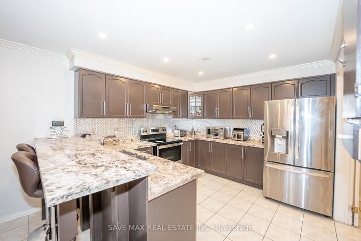 Photo 8 at 23 Edenvalley Road, Fletcher's Meadow, Brampton