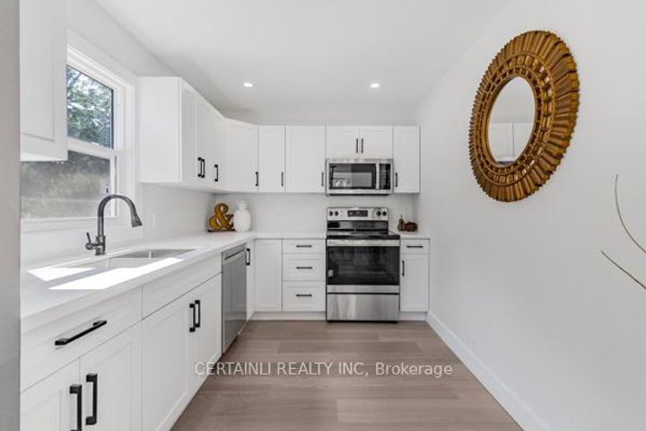 Photo 10 at 205 East 26th Street, Eastmount, Hamilton