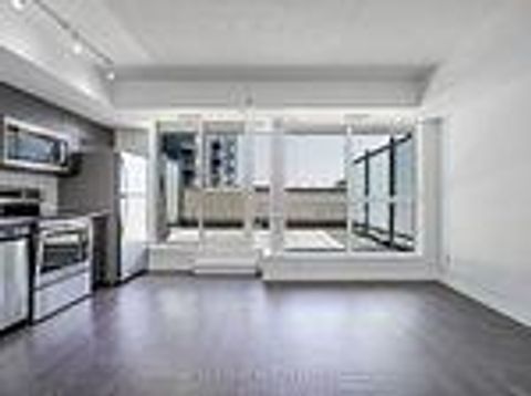 Photo 7 at 203 - 30 Meadowglen Place, Woburn, Toronto