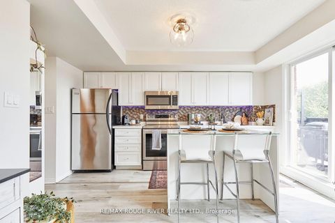 Photo 5 at 312 - 25 Strangford Lane, Birchmount, Toronto