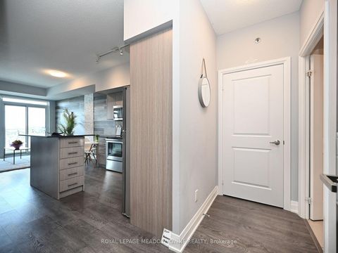 Photo 3 at 1210 - 55 Speers Road, CO Central, Oakville