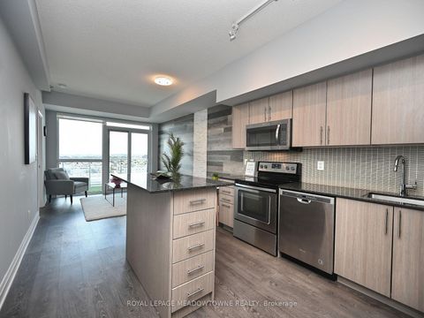Photo 4 at 1210 - 55 Speers Road, CO Central, Oakville