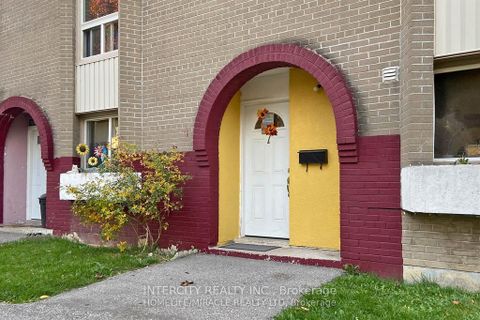 Photo 1 at 7 - 61 Driftwood Avenue, Jane Heights, Toronto