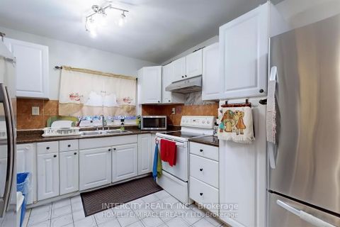 Photo 9 at 7 - 61 Driftwood Avenue, Jane Heights, Toronto