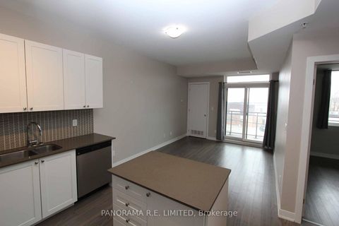 Photo 1 at 318 - 3560 St Clair Avenue E, Kennedy Park, Toronto