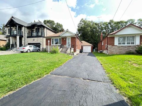 Photo 2 at 27 Rensburg Drive, Ionview, Toronto