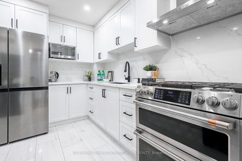 Photo 13 at 84 Lowry Square, Malvern, Toronto