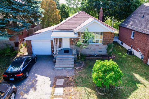 Photo 0 at 127 Flora Drive, Dorset Park, Toronto