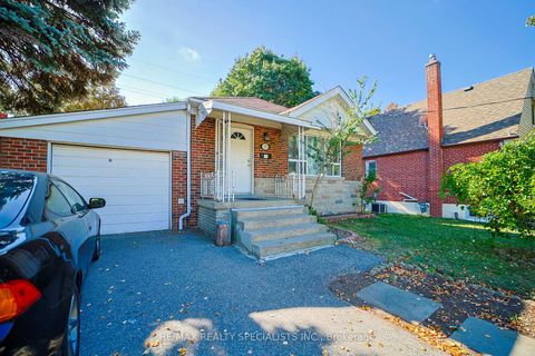 Photo 1 at 127 Flora Drive, Dorset Park, Toronto