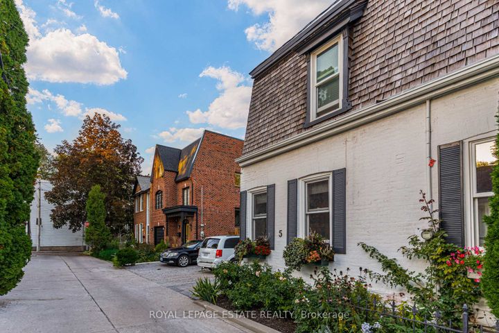 Photo 1 at 5 Woodstock Place, South St. James Town, Toronto