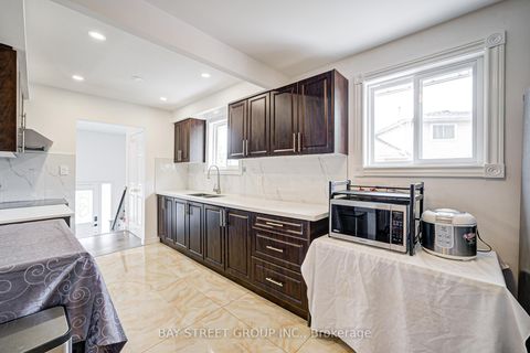 Photo 6 at 64 Rakewood Crescent, L'Amoreaux, Toronto