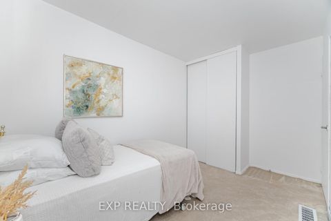 Photo 12 at 125 Hollyberry Trail, Hillcrest Village, Toronto