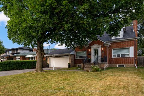 Photo 1 at 103 Neilson Drive, Markland Wood, Toronto