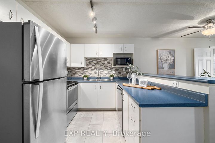Photo 4 at 209 - 1441 Walker's Line, Tansley, Burlington
