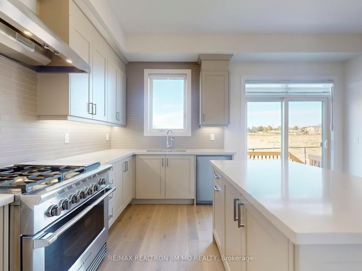 Photo 7 at 20 Nanhai Avenue, Angus Glen, Markham