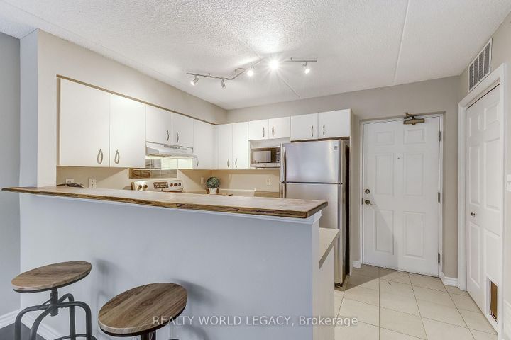Photo 4 at 103 - 2055 Appleby Line, Uptown, Burlington