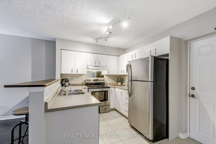 Photo 6 at 103 - 2055 Appleby Line, Uptown, Burlington