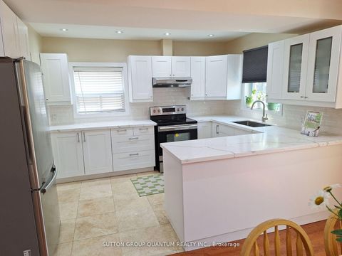 Photo 2 at 74 Cliff Street, Smythe, Toronto