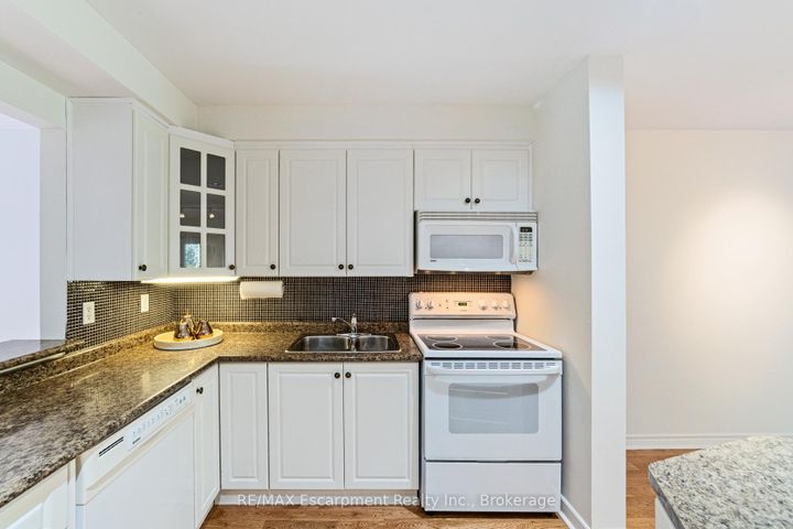 Photo 15 at 5 - 2065 Sixth Line, RO River Oaks, Oakville