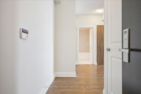 Photo 3 at Lph 01 - 55 Speers Road, CO Central, Oakville