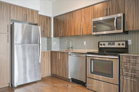Photo 14 at Lph 01 - 55 Speers Road, CO Central, Oakville