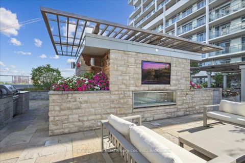 Photo 36 at Lph 01 - 55 Speers Road, CO Central, Oakville
