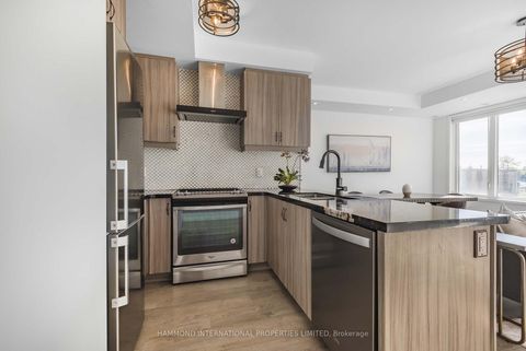 Photo 10 at 114 - 600 Alex Gardner Circle, Aurora Village, Aurora