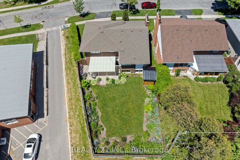 Photo 2 at 51 Sloley Road, Cliffcrest, Toronto