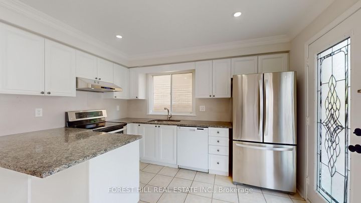 Photo 5 at 4 Lionheart Lane, Berczy, Markham