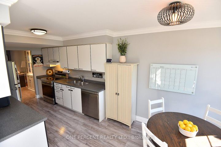 Photo 14 at 203 - 2075 Walkers Line, Rose, Burlington